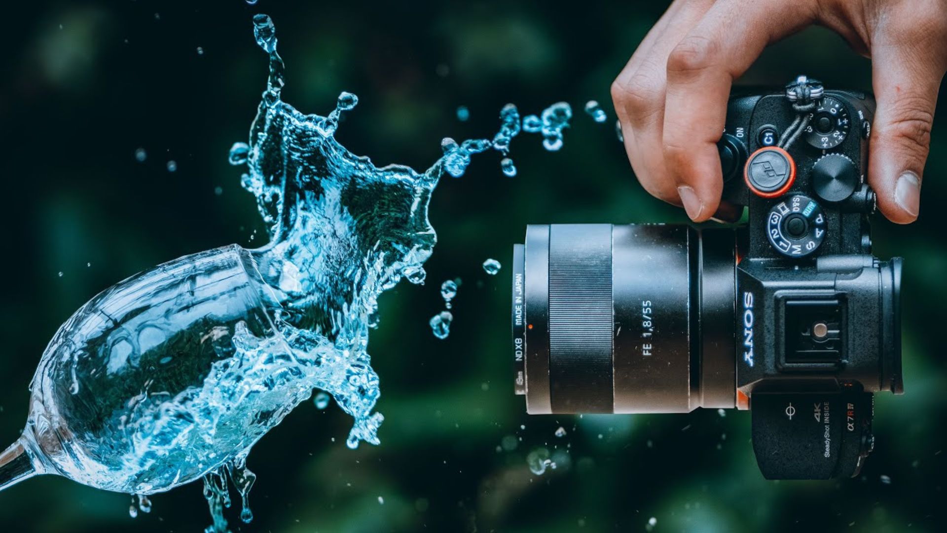 a person hold a camera taking a photography of water